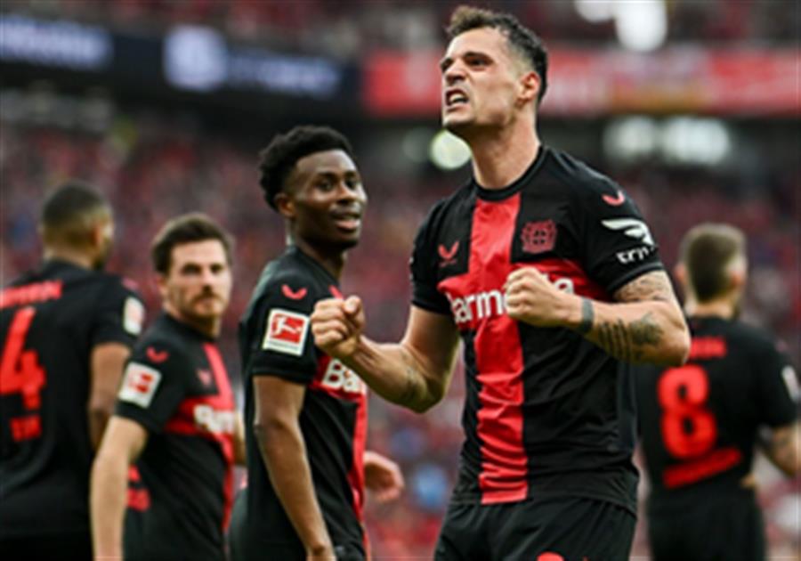 Leverkusen romps past Bremen to clinch first Bundesliga title